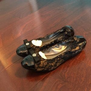 Black and gold lace flats